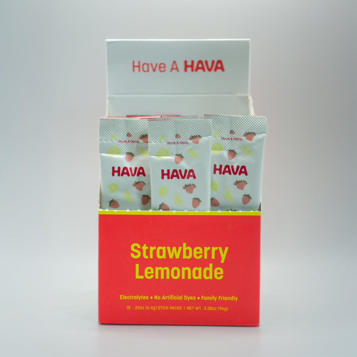 A HAVA brand display box of Strawberry Lemonade electrolyte packets, featuring three individual foil packets in front of a red and white box on a light gray background.