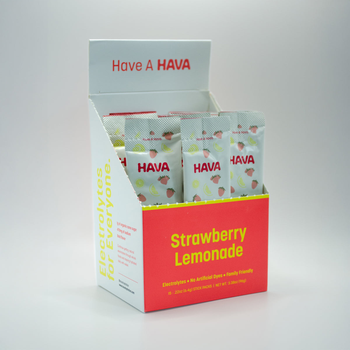 A retail display box filled with HAVA Electrolytes for Everyone Strawberry Lemonade packets, photographed on a clean white studio background.