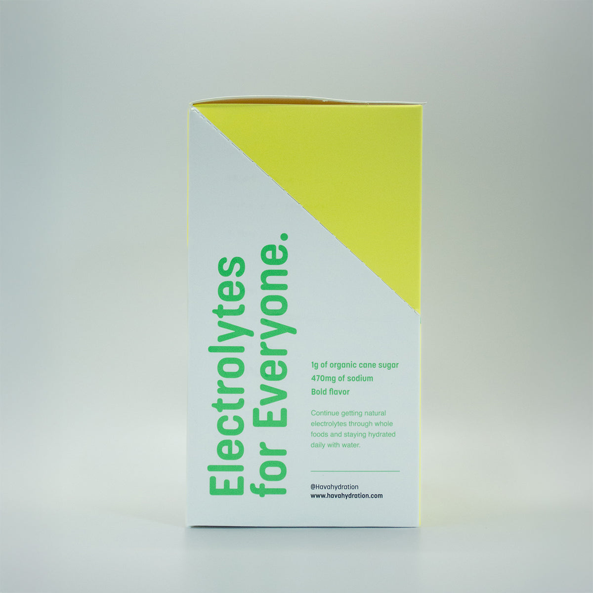 A tall rectangular product box for electrolytes, shown upright against a light gray studio background. The box is white with a large bright yellow diagonal section and green text reading 'Electrolytes for Everyone.
