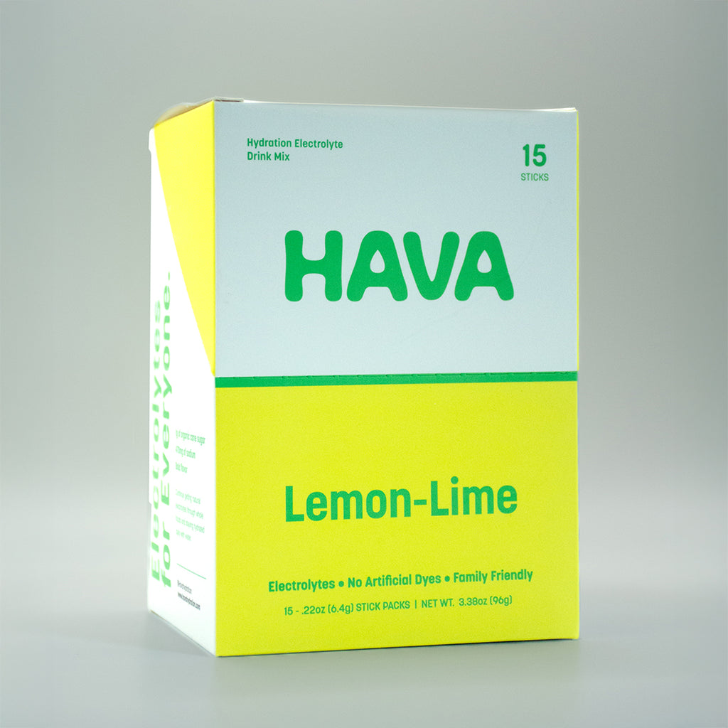 A box of HAVA Lemon-Lime Hydration Electrolyte Drink Mix, featuring a bright yellow and white packaging design with green text, photographed on a neutral gray background.